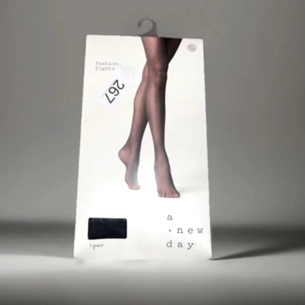 A New Day brand fashion tights in size 1x/2xl. Black W/Z Pattern 5ft-6ft 180-270